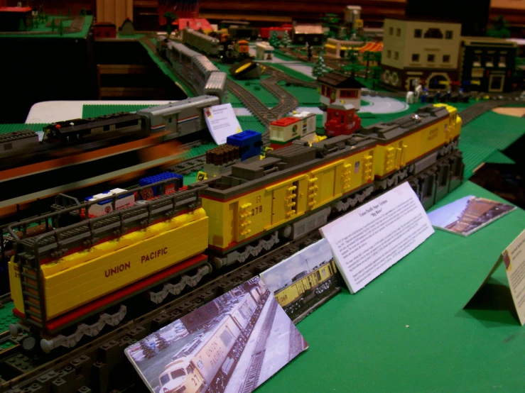 train tracks near construction site and information boards