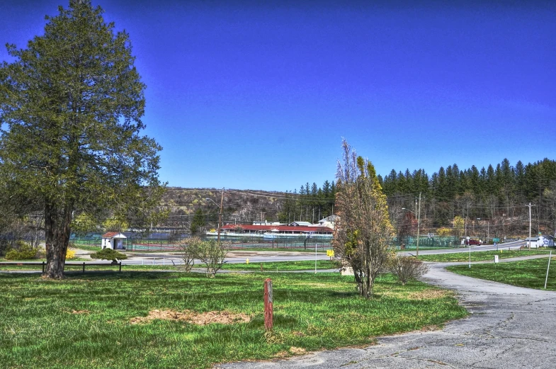 the path to the parking lot leads toward the resort