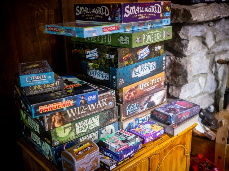 several games are stacked in the middle of the picture