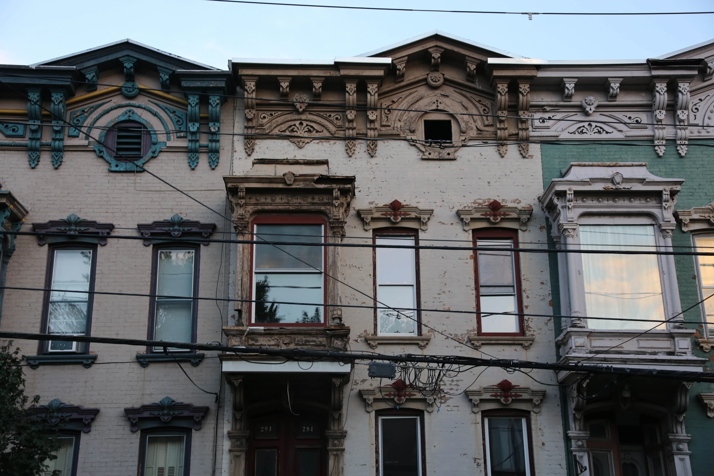 an old building with many windows and balconies