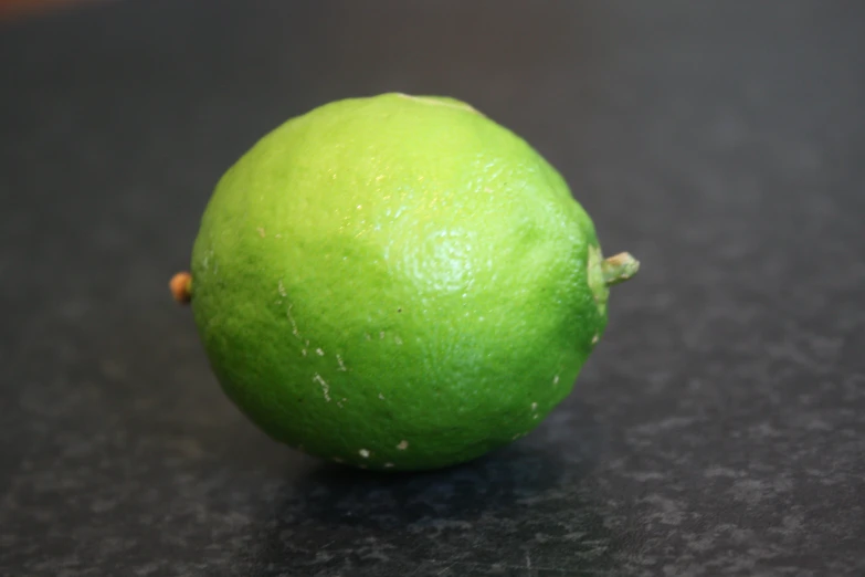 an up close s of a lime on a table