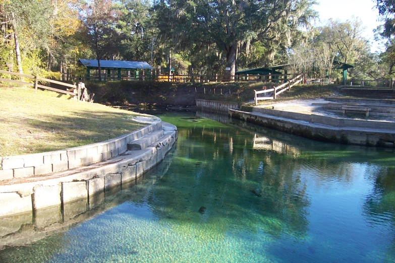 water is shown at the edge of a park