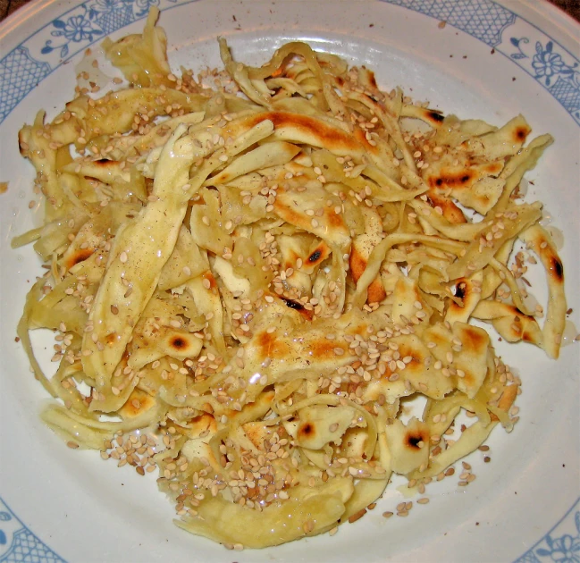 an image of pasta on a plate on the table