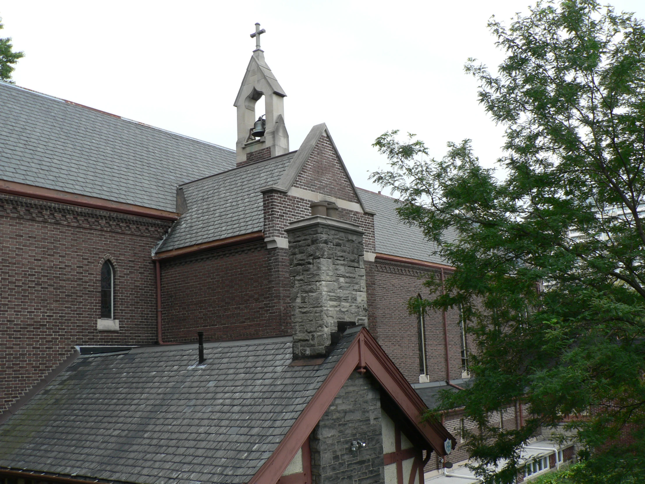 a church with the steeple made of brick