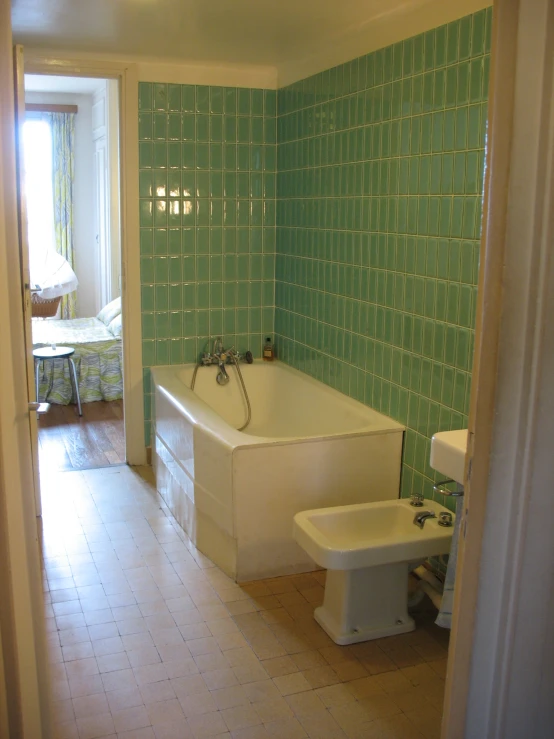 a white bath tub sitting next to a window