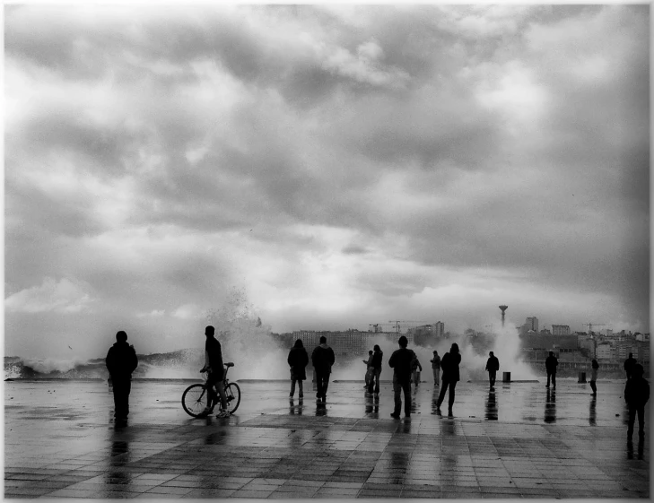 a group of people with bikes and bicycle's in a row