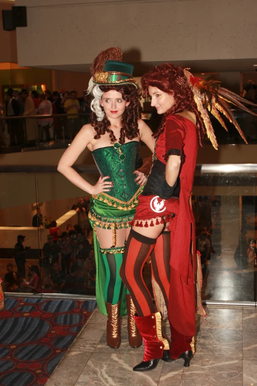 two woman in costume standing next to each other