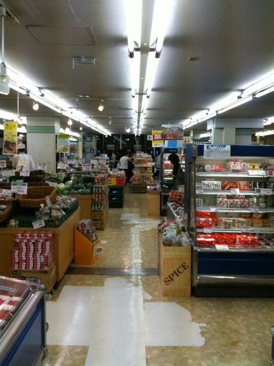 a supermarket that has several shelves filled with food