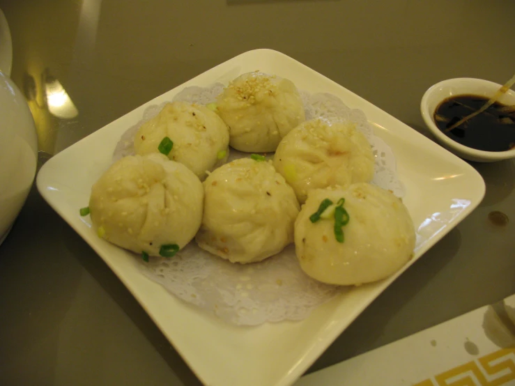 some food on a small white plate