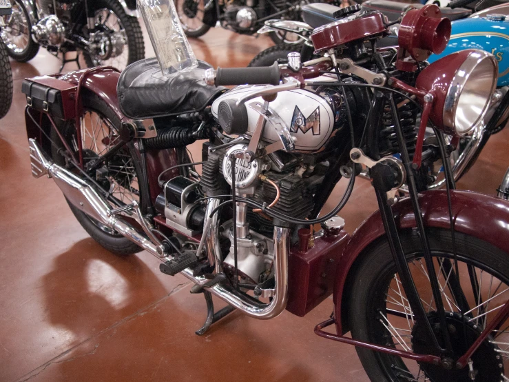 several motorcycles are arranged in rows on display