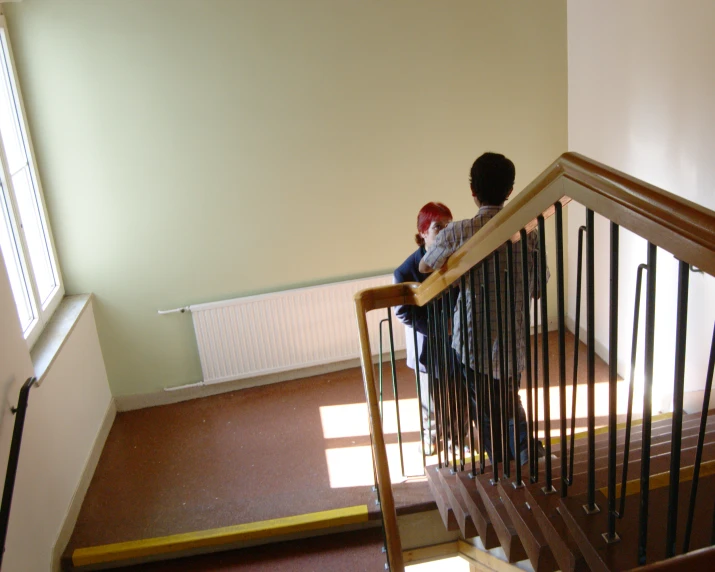 two children on the front steps of a house