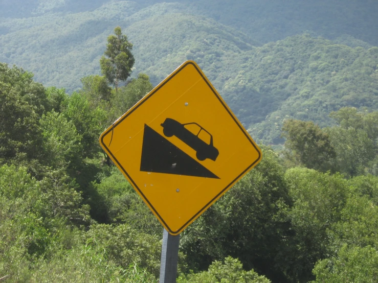 there is a traffic sign warning of the possible accident