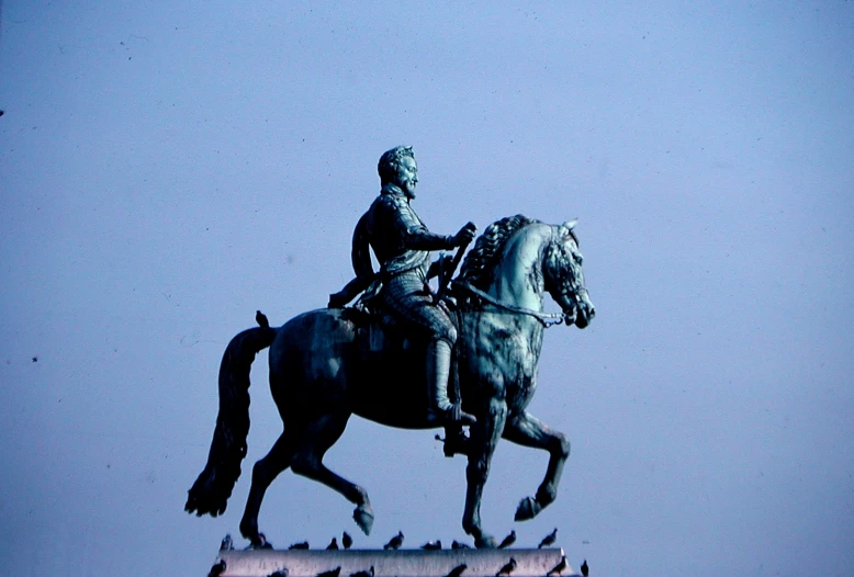 a statue that is on top of a building