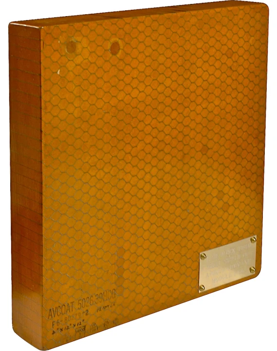 an orange and gold plastic envelope with two rivet holes