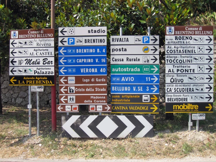 the sign is set up on the side of the road