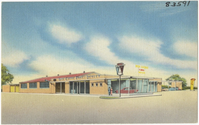 an old postcard features the main part of the motel