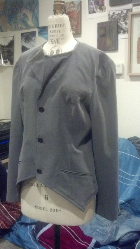 a woman's jacket on display in a room