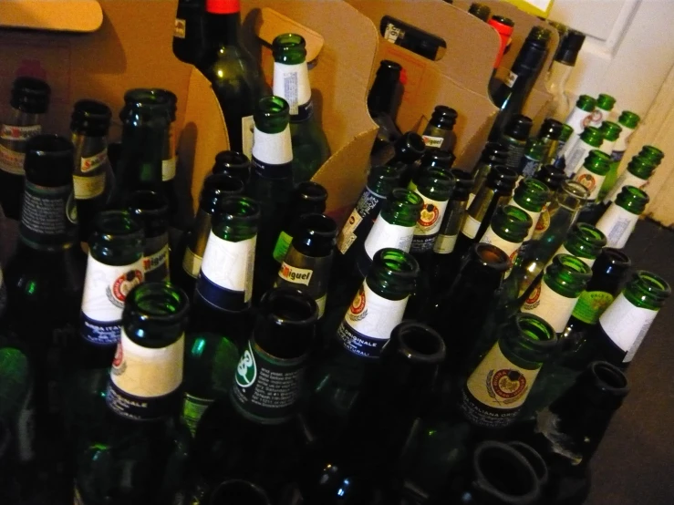 a pile of bottles with no tops on them