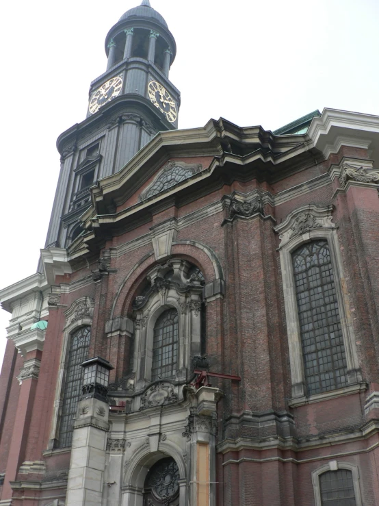 a very old church with a tall tower