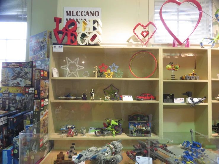 a display case with many different toys and figures in it