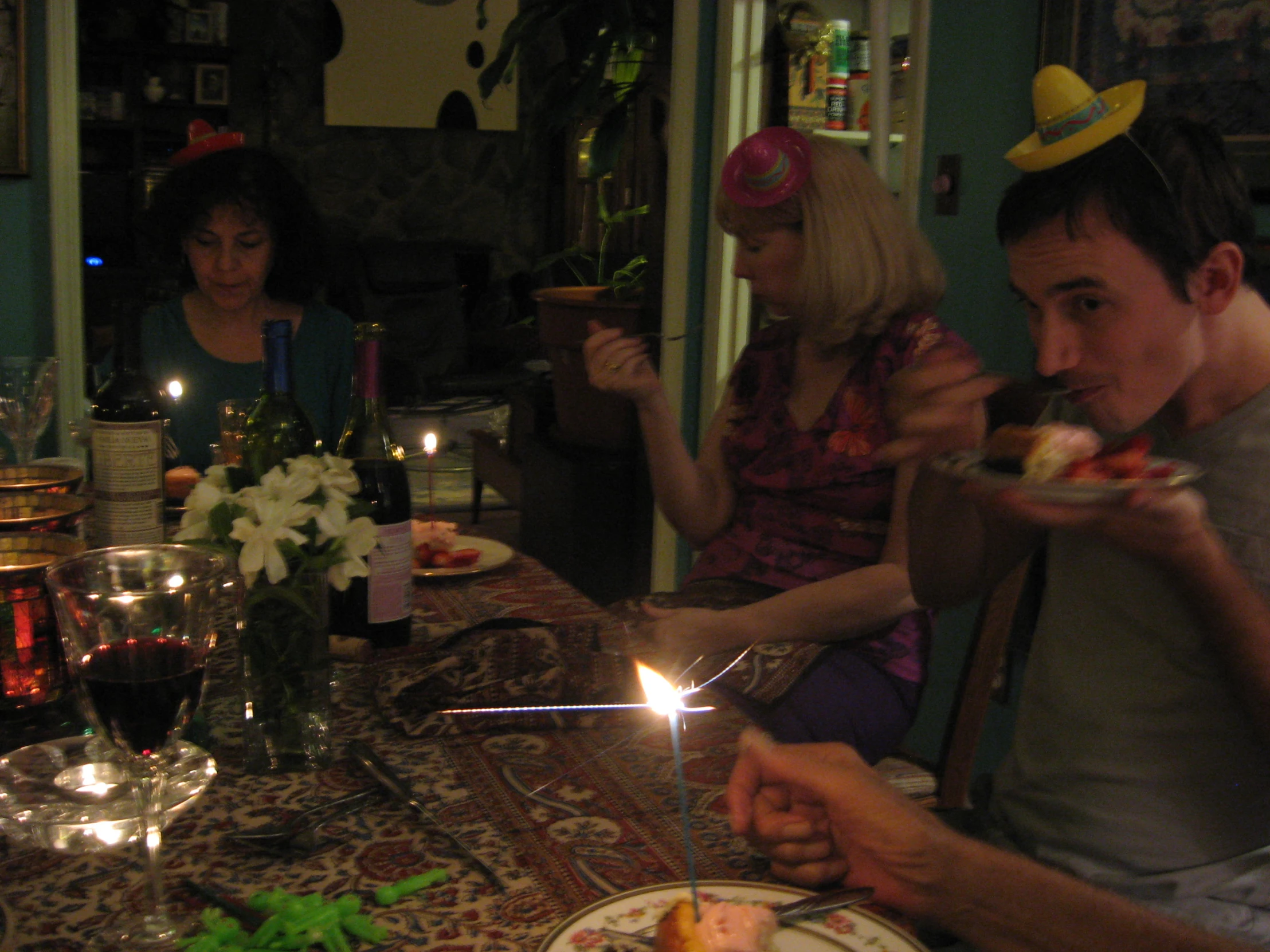 a group of people sitting at a dinner table