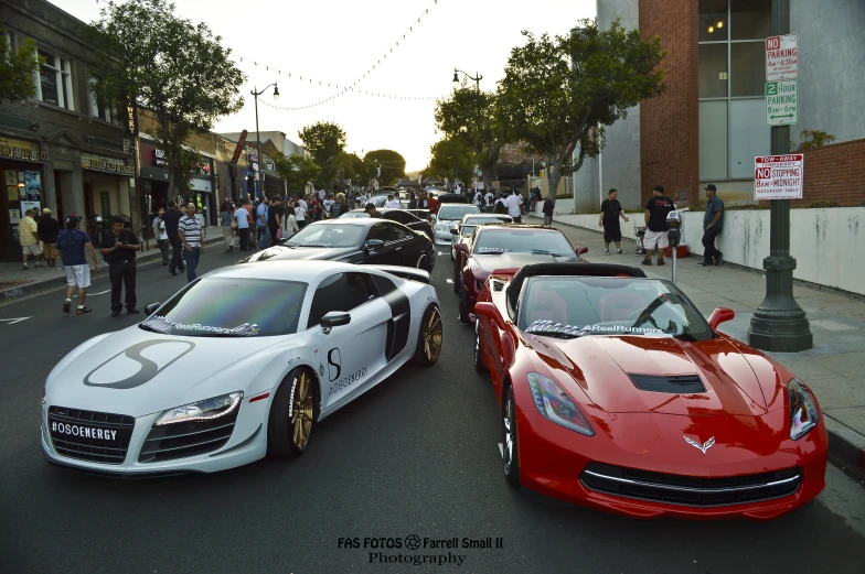 sports car race in the street for some viewing