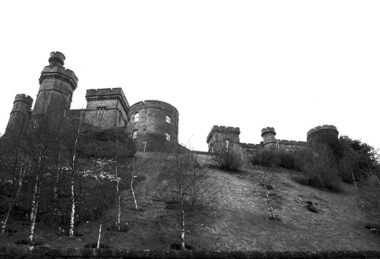 the castle is very high on the side of the hill