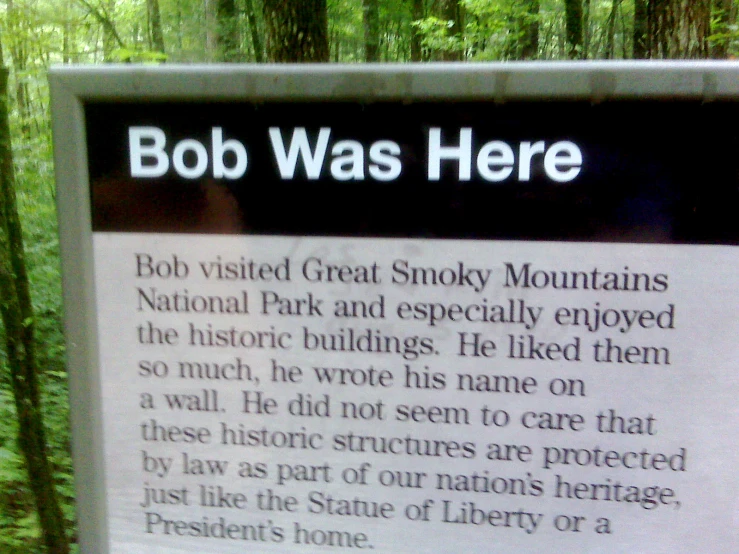 a sign is describing bob was here, bob visited great smoky mountains national park and especially enjoyed the historic buildings he liked them so much