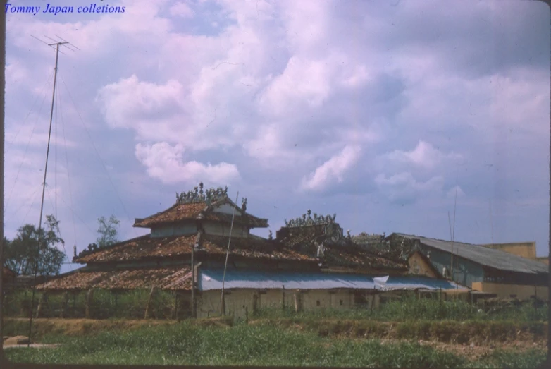 a house with many wood shingles near it