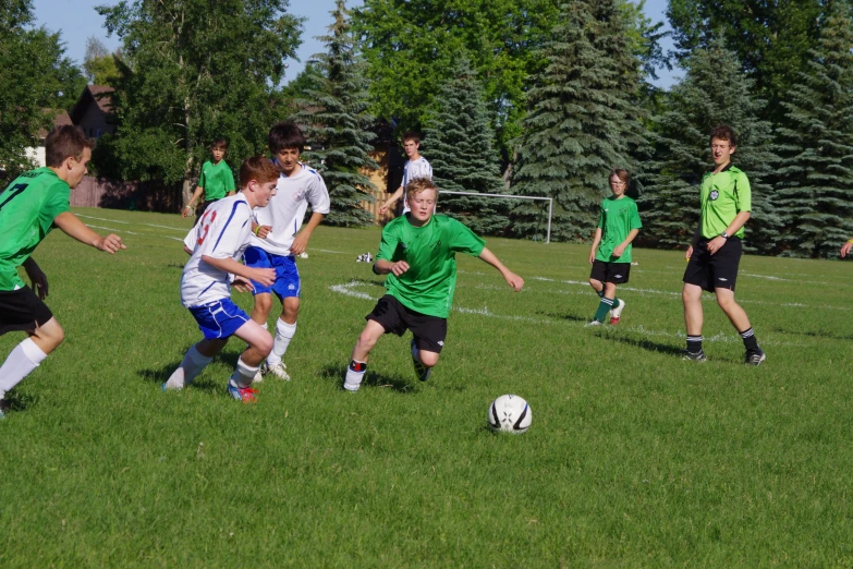 two teams are competing in a soccer game