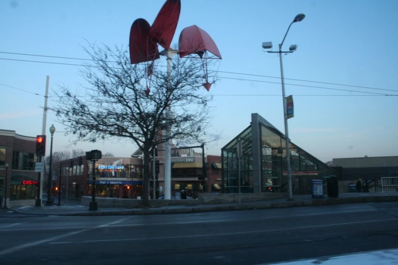 a store with large heart decorations hanging off the sides