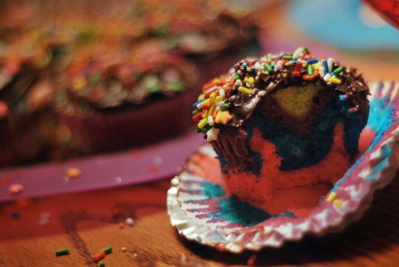 the cupcake has sprinkles on it