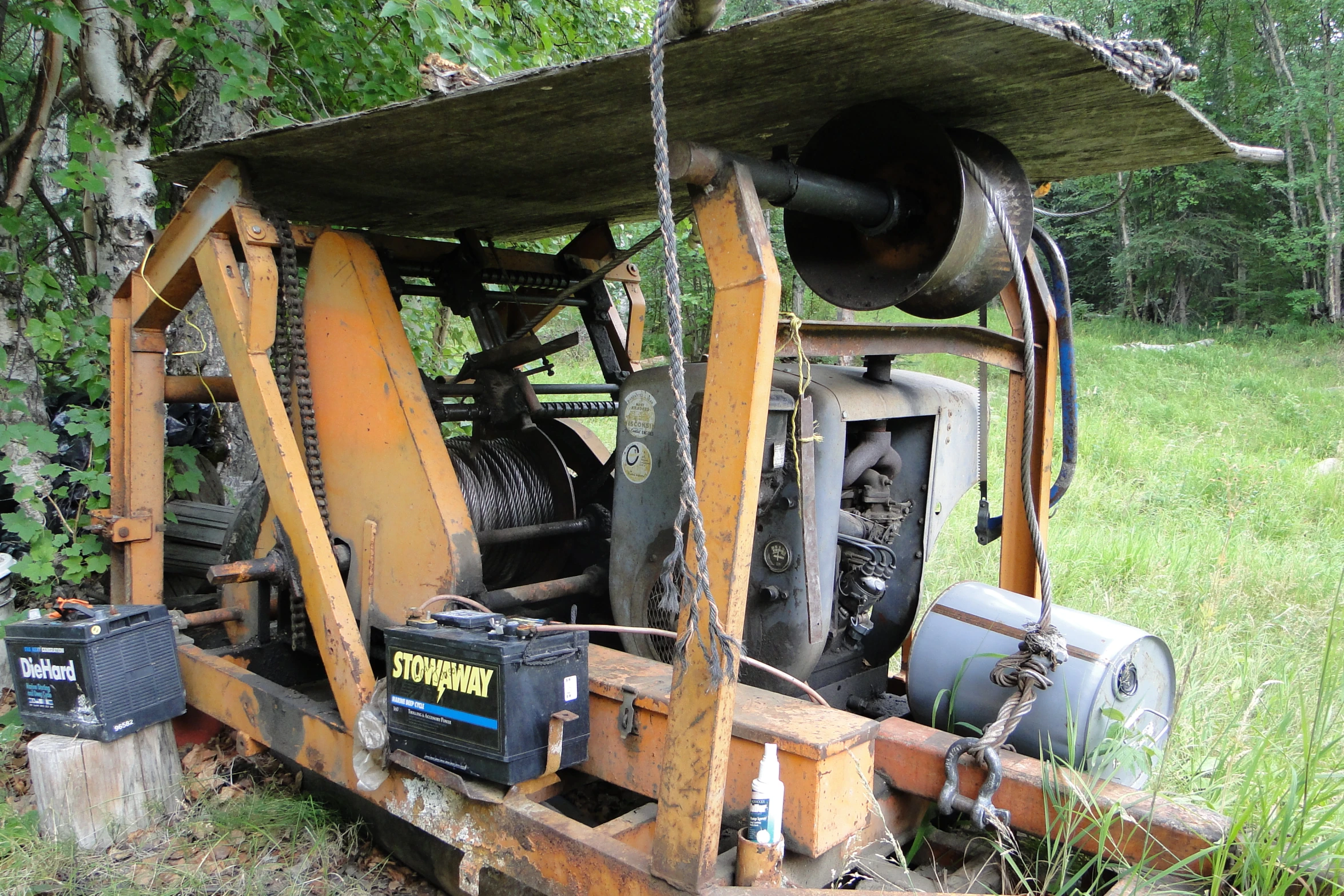 an old, dirty train is being worked on