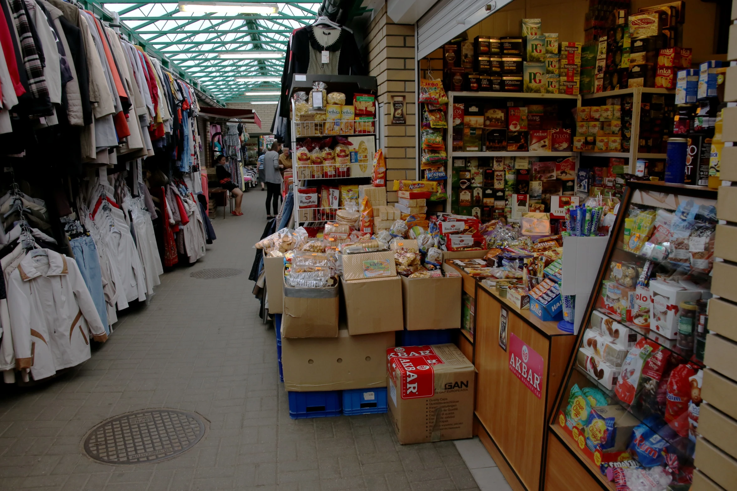 there is an asian store with clothes and items on display