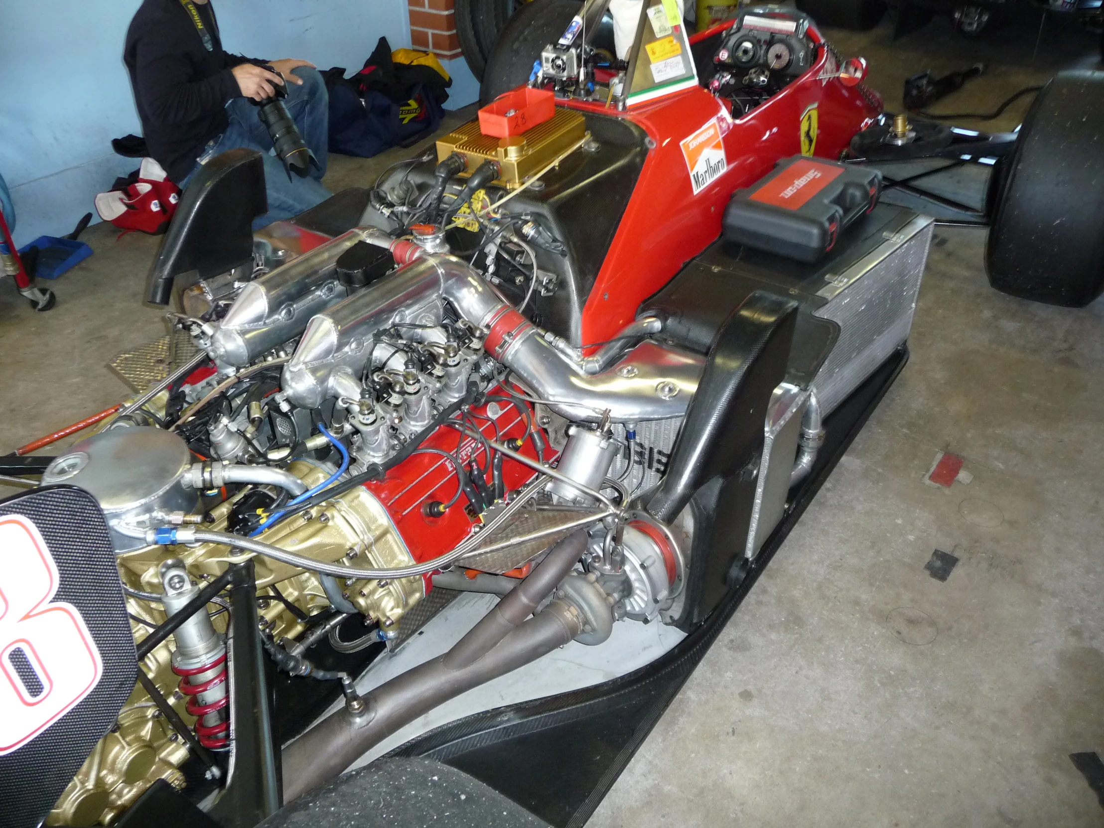 a car engine is attached to the underside of the vehicle