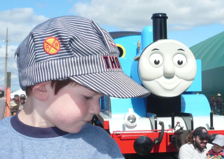 a  looks at a thomas the tank train replica