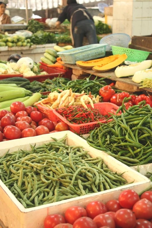 an open air market displays fresh produce for sale