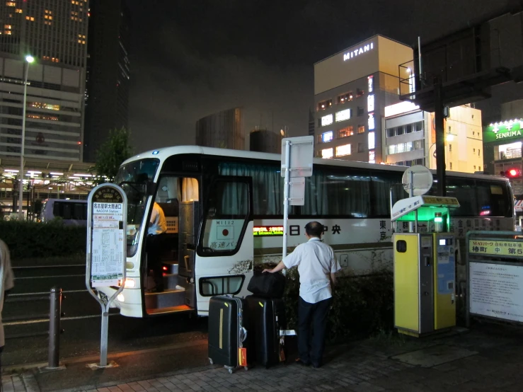 a bus that is sitting next to some trash