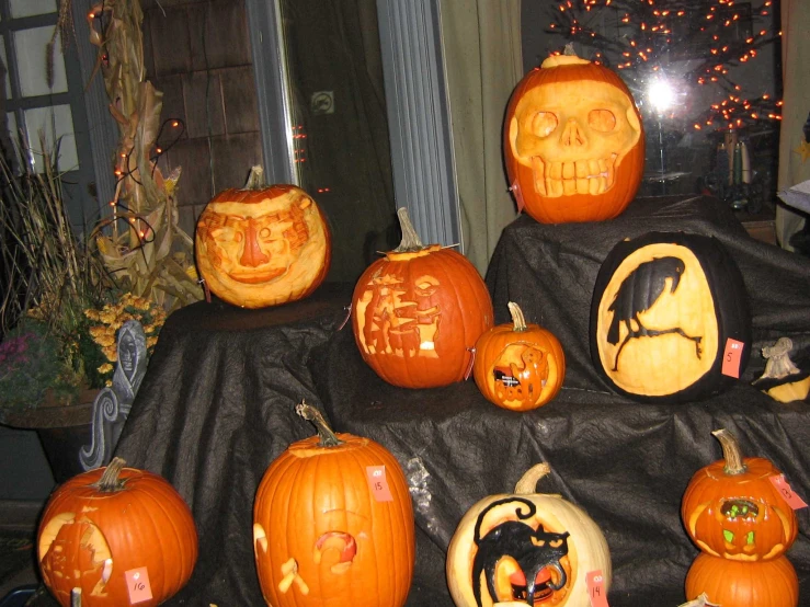 an image of carved pumpkins with decorations on them