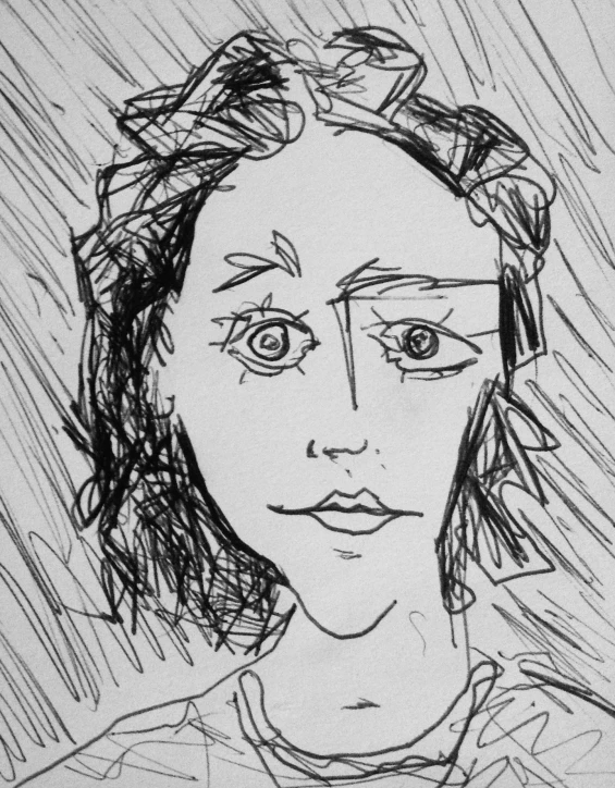 a girl's face is depicted on paper