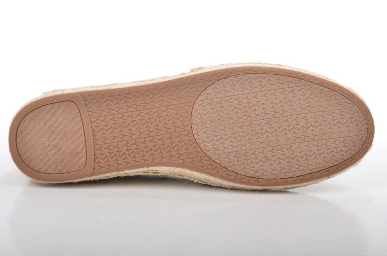 a woman's shoe that has no soles on it