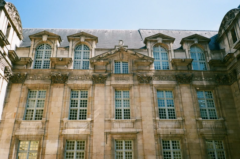 a huge building with windows in front of it