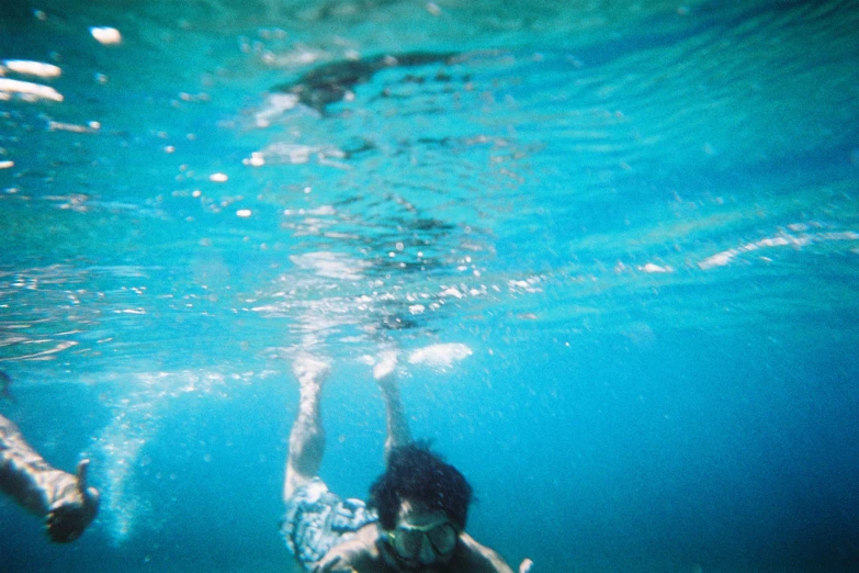 a person is swimming in a body of water