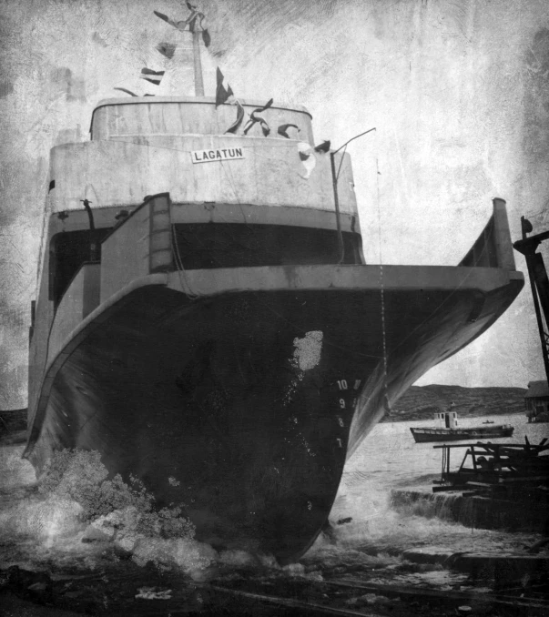 a large ship on the water in a dry dock