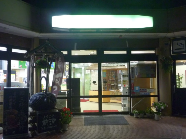 the inside entrance of a store at night