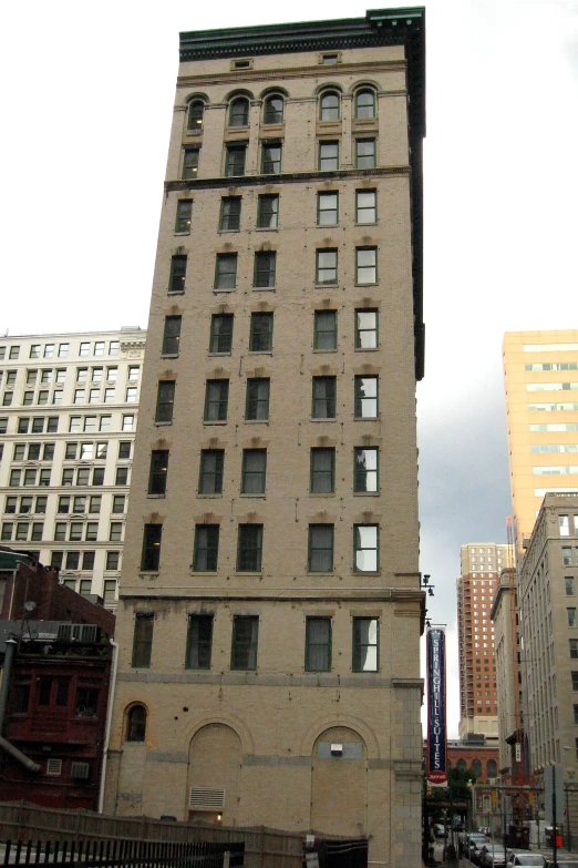 tall buildings with windows near a city street