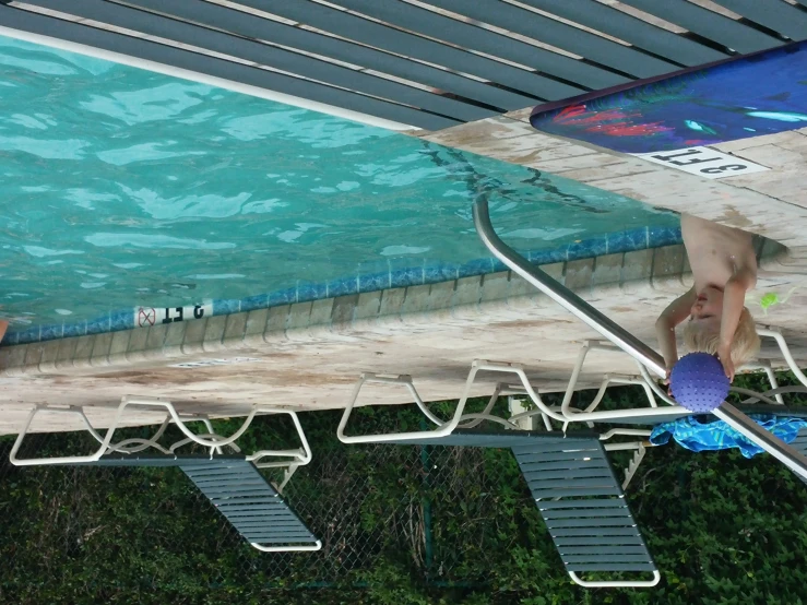 two children are bathing in the swimming pool