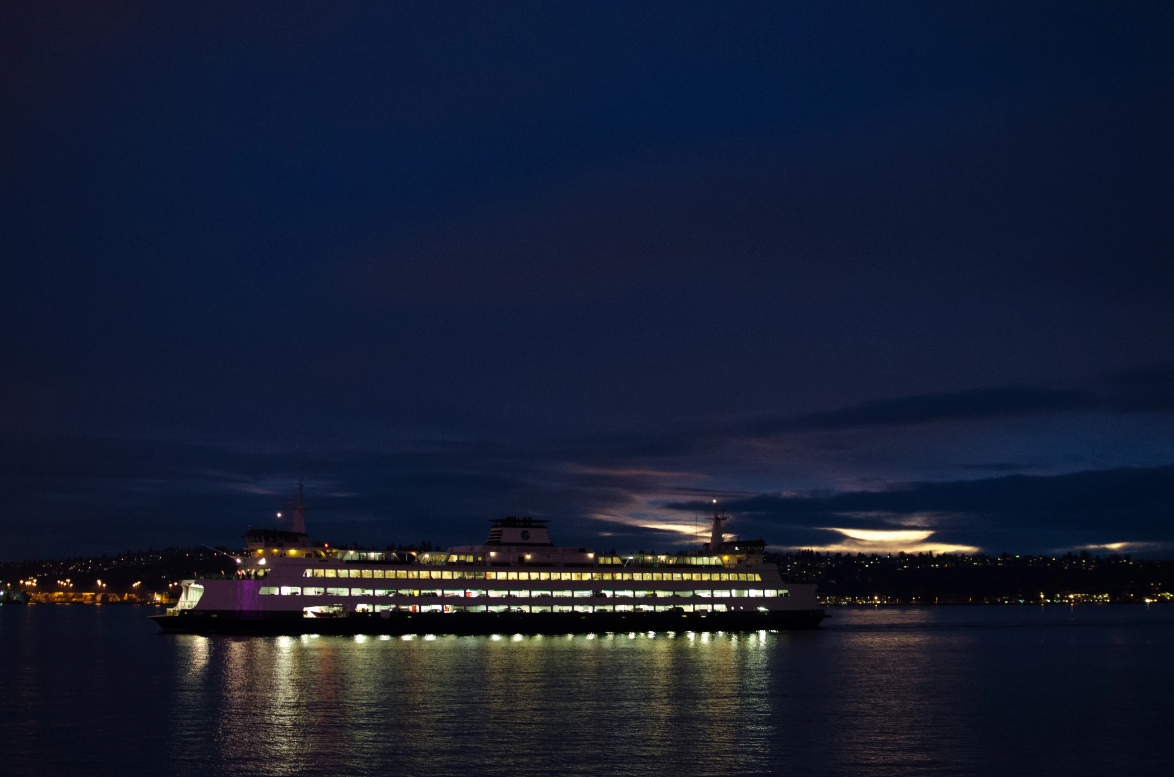 a large ship is sailing through a bay