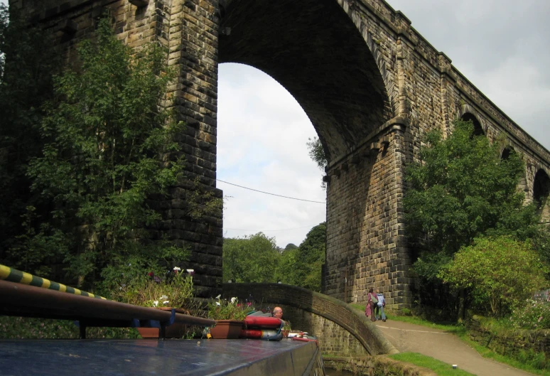 a view of an arched bridge over a river