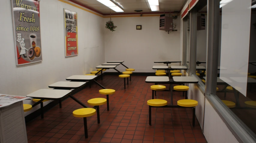 a bunch of small tables that are on the wall